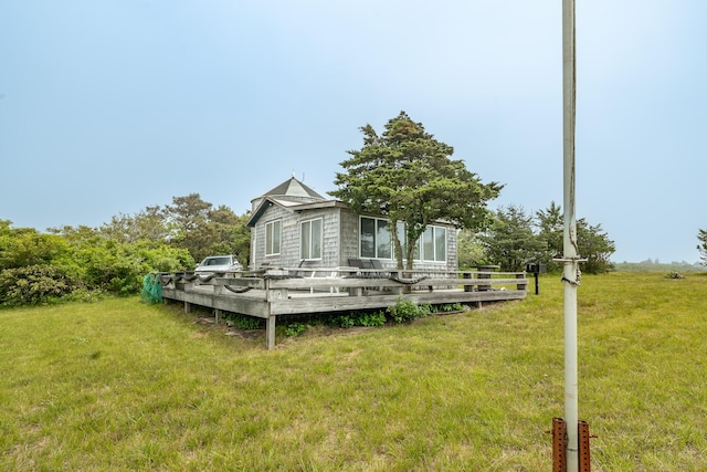 108 Bay View Ave, Edgartown, MA 02539 - rear view of property featuring a yard and a wooden deck