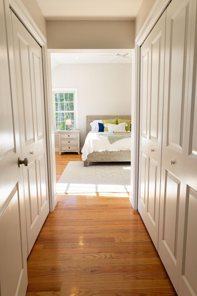 55 Blue Castle Dr, Mashpee, MA 02649 - bedroom with light wood-style floors and lofted ceiling