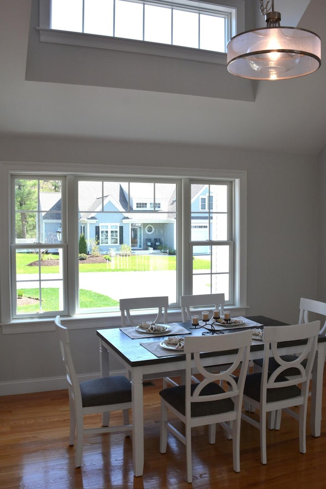 55 Blue Castle Dr, Mashpee, MA 02649 - dining space with plenty of natural light, wood finished floors, and baseboards