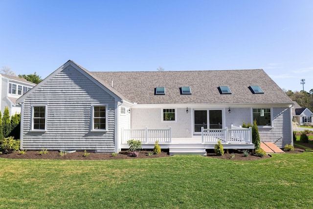 55 Blue Castle Dr, Mashpee, MA 02649 - back of house featuring a deck, a yard, and roof with shingles
