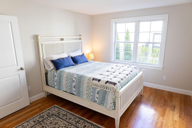 55 Blue Castle Dr, Mashpee, MA 02649 - bedroom featuring wood finished floors and baseboards