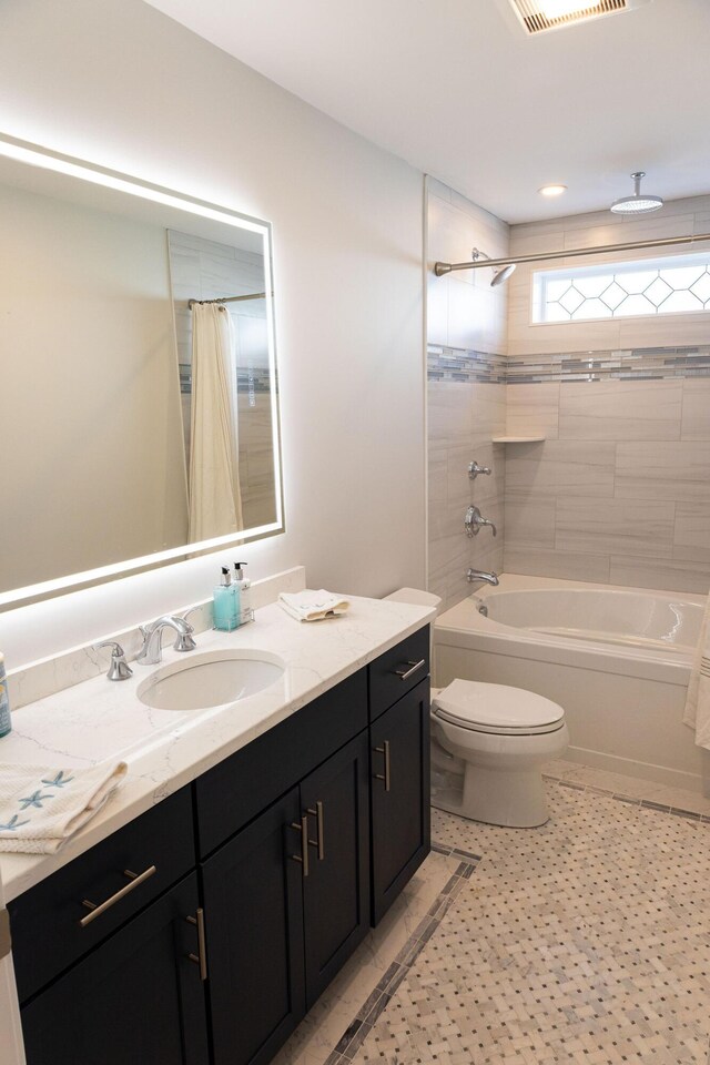 55 Blue Castle Dr, Mashpee, MA 02649 - bathroom featuring shower / tub combo with curtain, toilet, and vanity