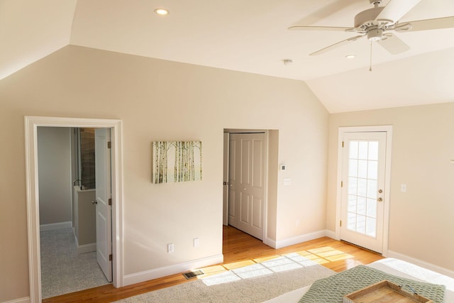 55 Blue Castle Dr, Mashpee, MA 02649 - unfurnished bedroom featuring lofted ceiling, light wood-style floors, baseboards, access to exterior, and ceiling fan