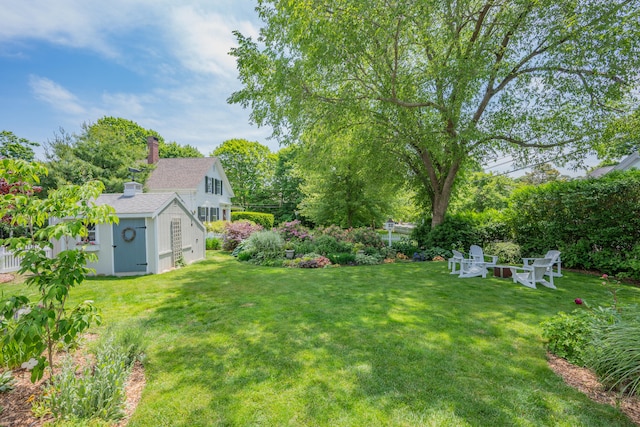 5 Putnam Ave, Cotuit, MA 02635 - view of green lawn with an outdoor structure