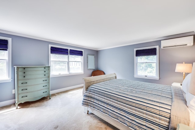 46 Juniper Ln W, South Chatham, MA 02659 - bedroom featuring crown molding, baseboards, multiple windows, and an AC wall unit
