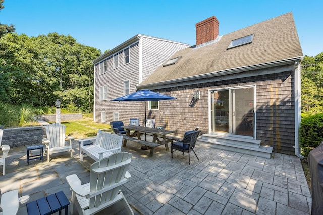 46 Juniper Ln W, South Chatham, MA 02659 - view of patio featuring outdoor dining area