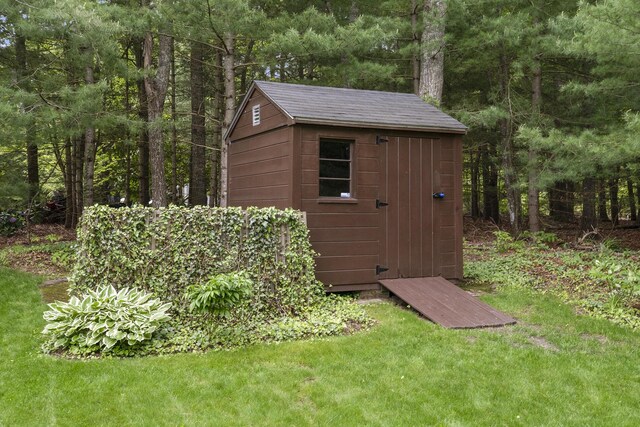 29 Braeburn Ct, Hatchville, MA 02536 - view of shed with a forest view