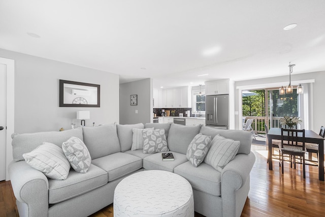 29 Braeburn Ct, Hatchville, MA 02536 - living area featuring dark wood-type flooring and recessed lighting