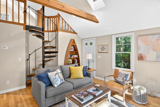 50 Piper Ln, Eastham, MA 02642 - living room featuring light wood-style floors, stairs, and a skylight