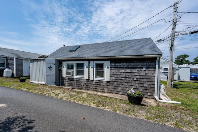 view of front of house with cooling unit