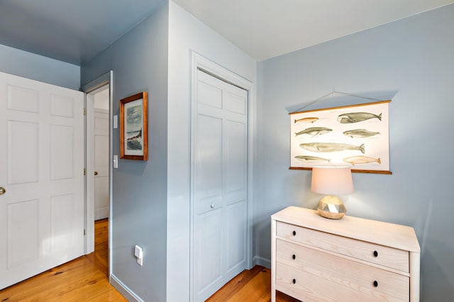 bedroom with light wood-style flooring