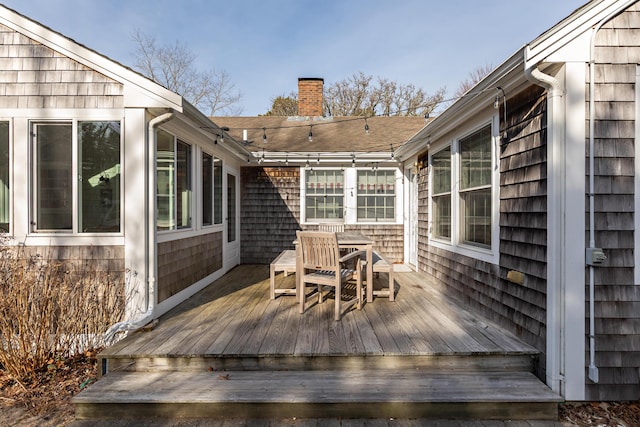 deck featuring outdoor dining space