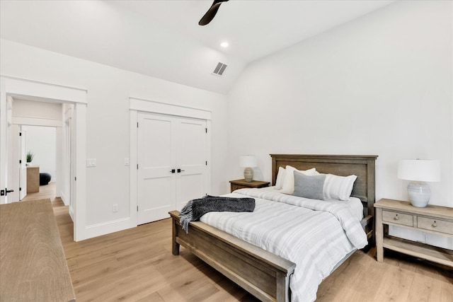 22 Country Club Ln, Mashpee, MA 02649 - bedroom featuring light wood finished floors, visible vents, a closet, and lofted ceiling