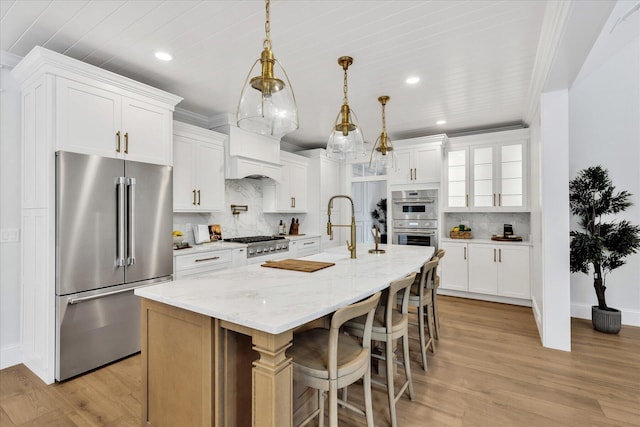 22 Country Club Ln, Mashpee, MA 02649 - kitchen with recessed lighting, decorative backsplash, white cabinetry, and stainless steel appliances