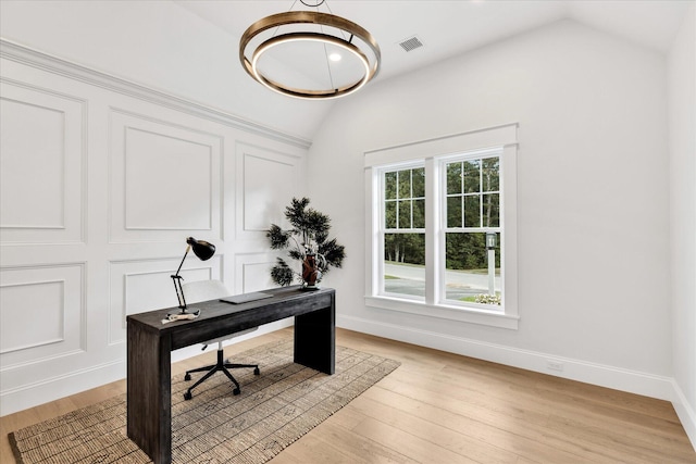 22 Country Club Ln, Mashpee, MA 02649 - home office featuring lofted ceiling, baseboards, visible vents, and light wood-type flooring