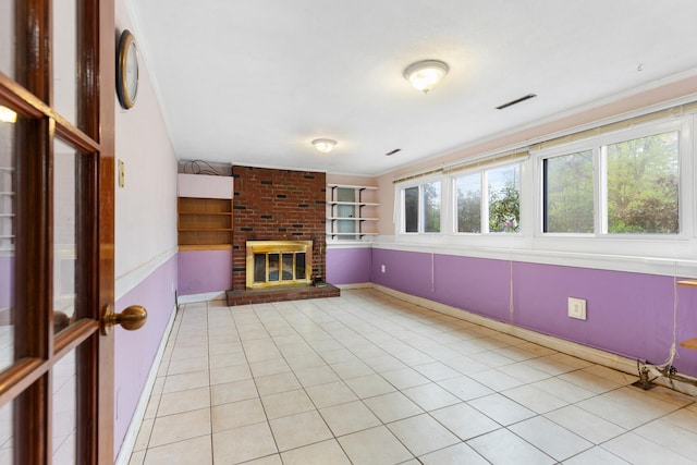 88 Hilltop St, Milton, MA 02186 - unfurnished living room featuring light tile patterned floors, a fireplace, and baseboards