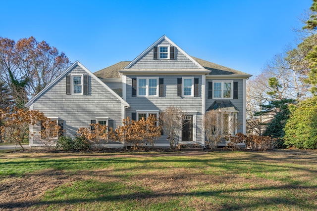 view of front facade with a front lawn