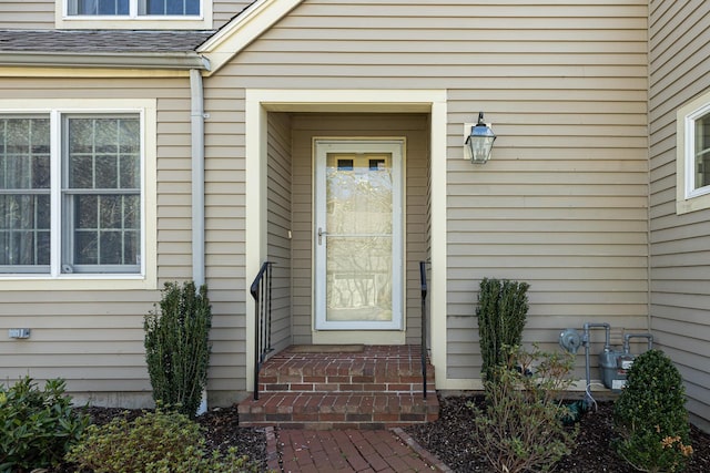 4 Bishops Park, Mashpee, MA 02649 - view of exterior entry with a shingled roof