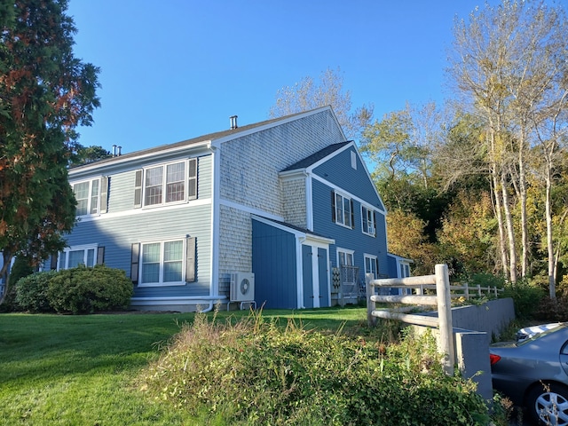 2 Englewood Dr Unit B-6, Harwich, MA 02645 - view of side of property with a cooling unit and a yard