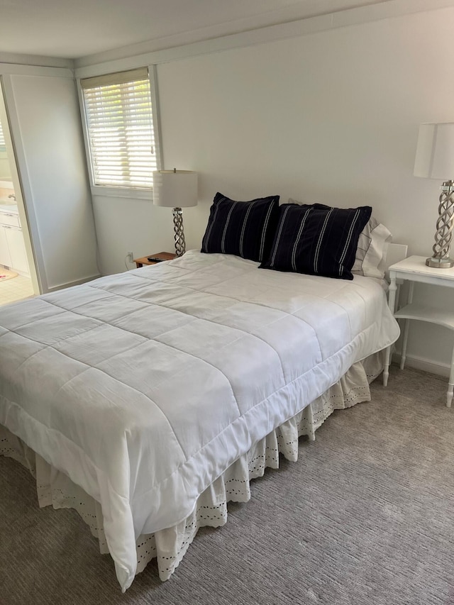 bedroom featuring carpet