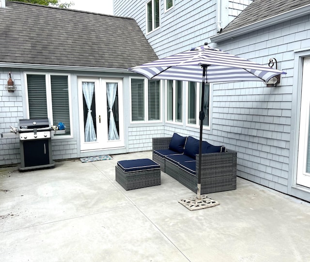 view of patio / terrace with an outdoor living space and area for grilling