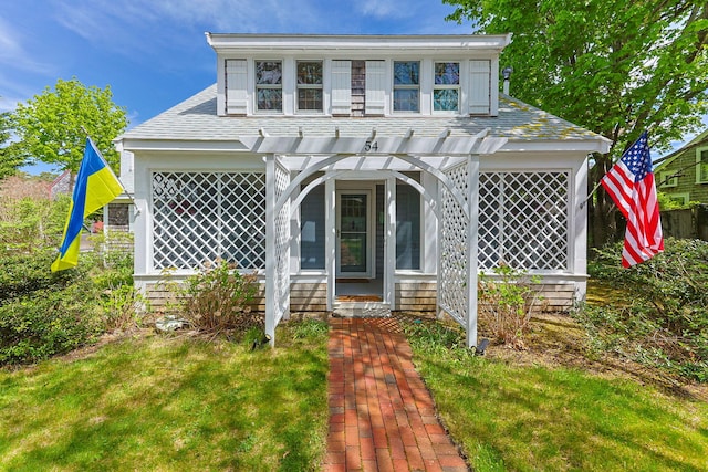 54 Smith St, West Harwich, MA 02671 - view of front facade featuring a porch and a front yard