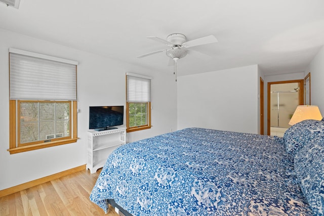 bedroom featuring ceiling fan and hardwood / wood-style flooring