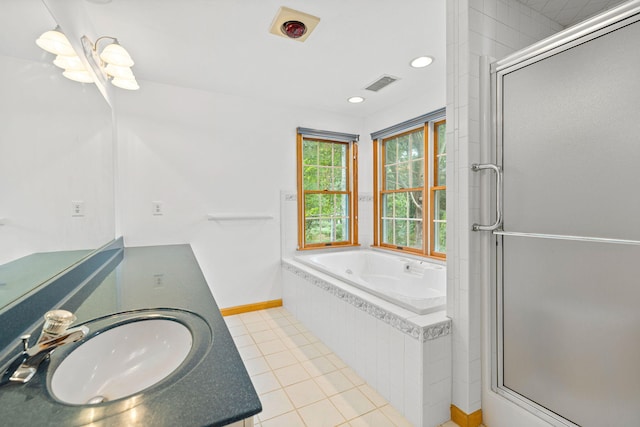 bathroom with separate shower and tub, tile patterned flooring, and vanity