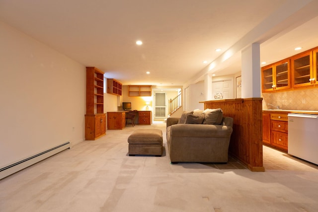 living area with recessed lighting, light colored carpet, stairs, and a baseboard heating unit