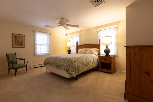 bedroom with visible vents, a ceiling fan, a baseboard radiator, baseboards, and light colored carpet