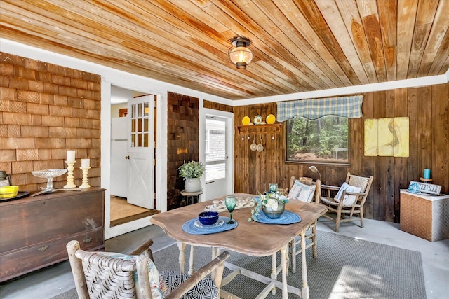 3 Five Corners Rd, Centerville, MA 02632 - dining room featuring wood ceiling, finished concrete floors, and wood walls
