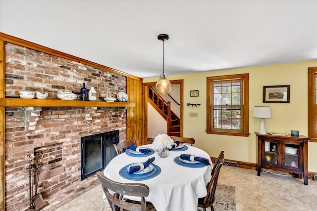 3 Five Corners Rd, Centerville, MA 02632 - dining area with a brick fireplace and stairway
