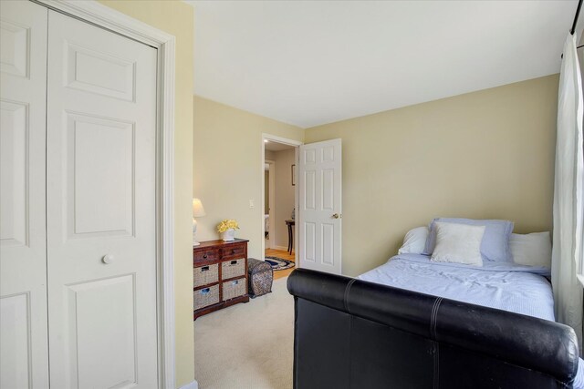 bedroom with light carpet