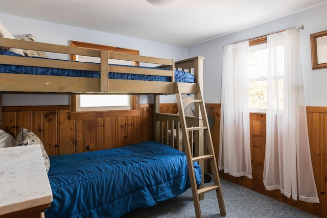 2 Naushon Rd, Mashpee, MA 02649 - carpeted bedroom featuring wood walls and a wainscoted wall