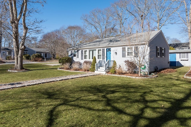2 Naushon Rd, Mashpee, MA 02649 - single story home with a front lawn and a shingled roof