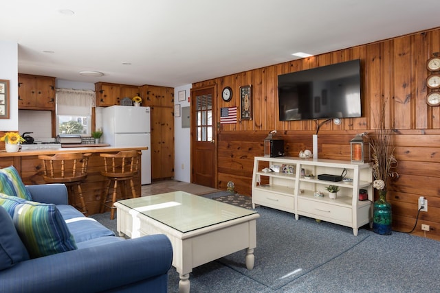 2 Naushon Rd, Mashpee, MA 02649 - carpeted living room with wooden walls