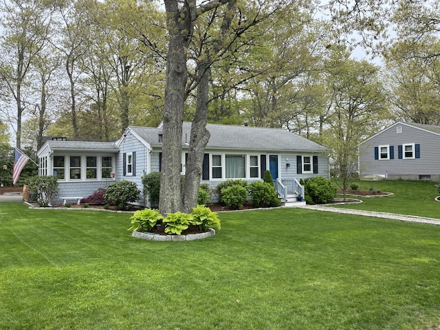 2 Naushon Rd, Mashpee, MA 02649 - view of front of home featuring a front lawn and a shingled roof