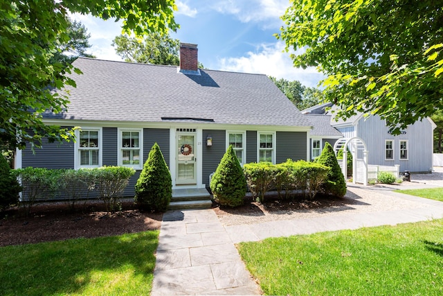 view of front of home with a front lawn