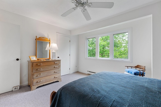 288 Fletcher Ln, Brewster, MA 02631 - bedroom featuring baseboard heating, light colored carpet, and ceiling fan