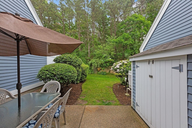 288 Fletcher Ln, Brewster, MA 02631 - view of grassy yard with outdoor dining area and a patio area