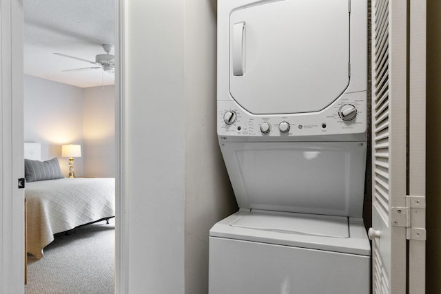 288 Fletcher Ln, Brewster, MA 02631 - laundry room with stacked washing machine and dryer and ceiling fan
