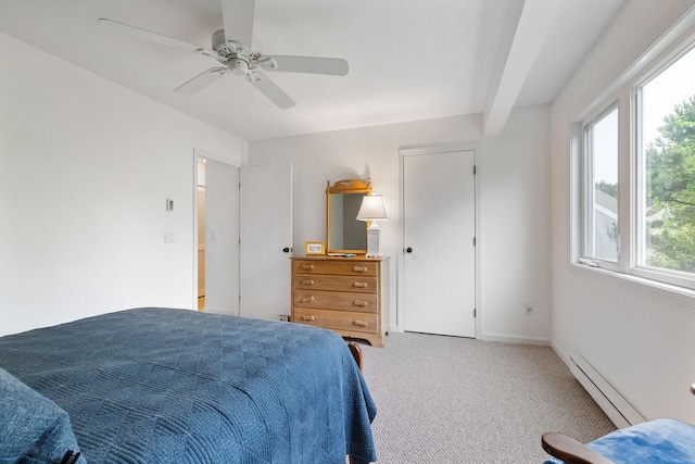 288 Fletcher Ln, Brewster, MA 02631 - carpeted bedroom featuring a baseboard heating unit and ceiling fan