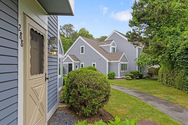 288 Fletcher Ln, Brewster, MA 02631 - view of side of home featuring a yard