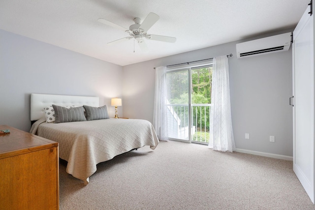 288 Fletcher Ln, Brewster, MA 02631 - bedroom featuring a wall unit AC, access to outside, carpet flooring, and a ceiling fan
