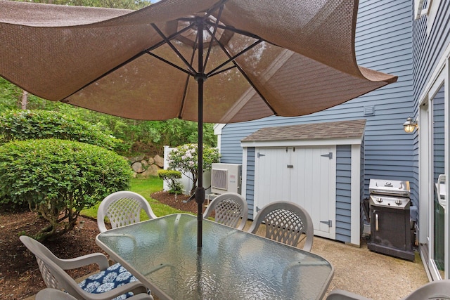 288 Fletcher Ln, Brewster, MA 02631 - view of patio featuring a grill and outdoor dining area
