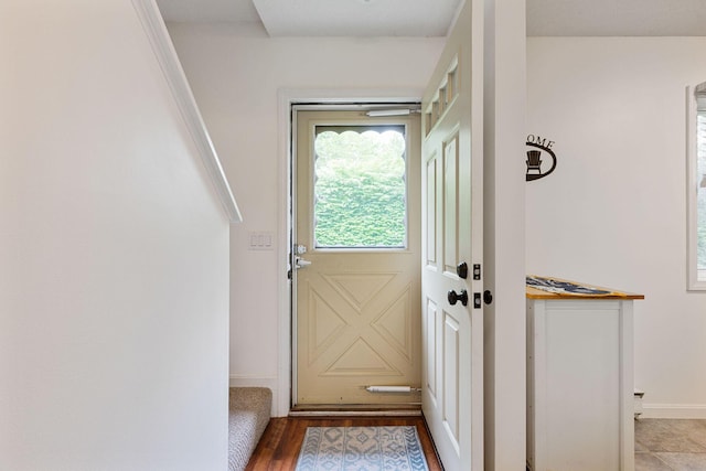 288 Fletcher Ln, Brewster, MA 02631 - doorway with baseboards and wood finished floors