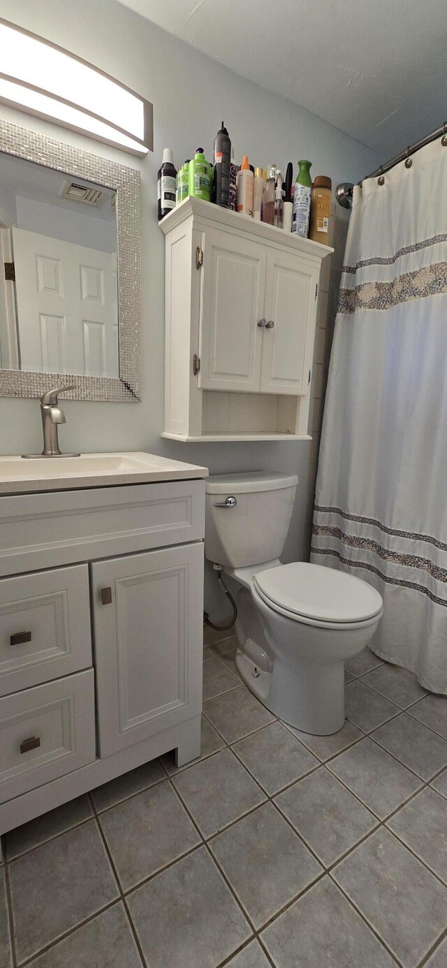 46B Beach Rd Unit 2, West Yarmouth, MA 02673 - full bathroom featuring tile patterned flooring, vanity, and a shower with shower curtain