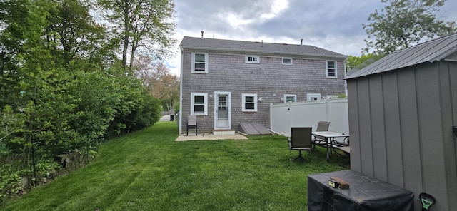 46B Beach Rd Unit 2, West Yarmouth, MA 02673 - rear view of property with a patio