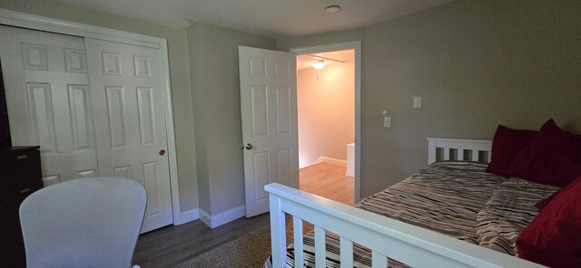 46B Beach Rd Unit 2, West Yarmouth, MA 02673 - view of green lawn with a storage unit and view of wooded area