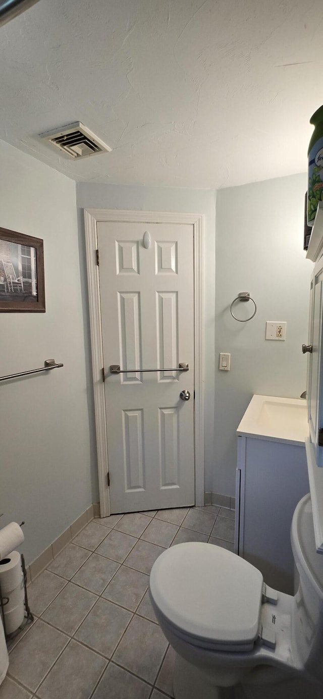 46B Beach Rd Unit 2, West Yarmouth, MA 02673 - bathroom featuring vanity, tile patterned floors, and a textured ceiling